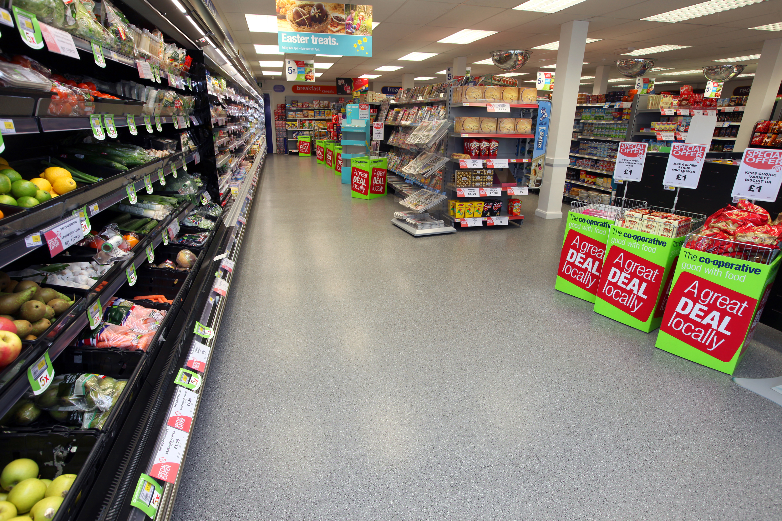 Decorative flake resin flooring refurbishment inside Lincolnshire Co-operative Ltd - Resin Flooring Contractors-problematic flooring. How quickly can our floors be laid- resin flooring installation speed