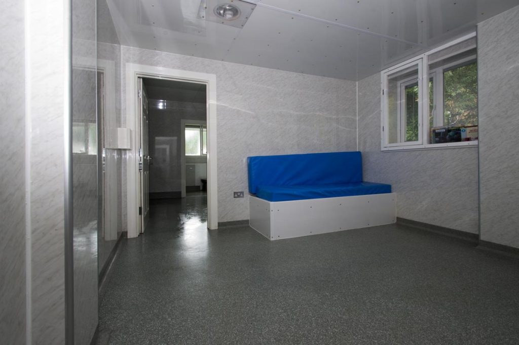 Glebelands housing with bed and flooring. Secure hygienic resin flooring solutions for Mental Health facilities