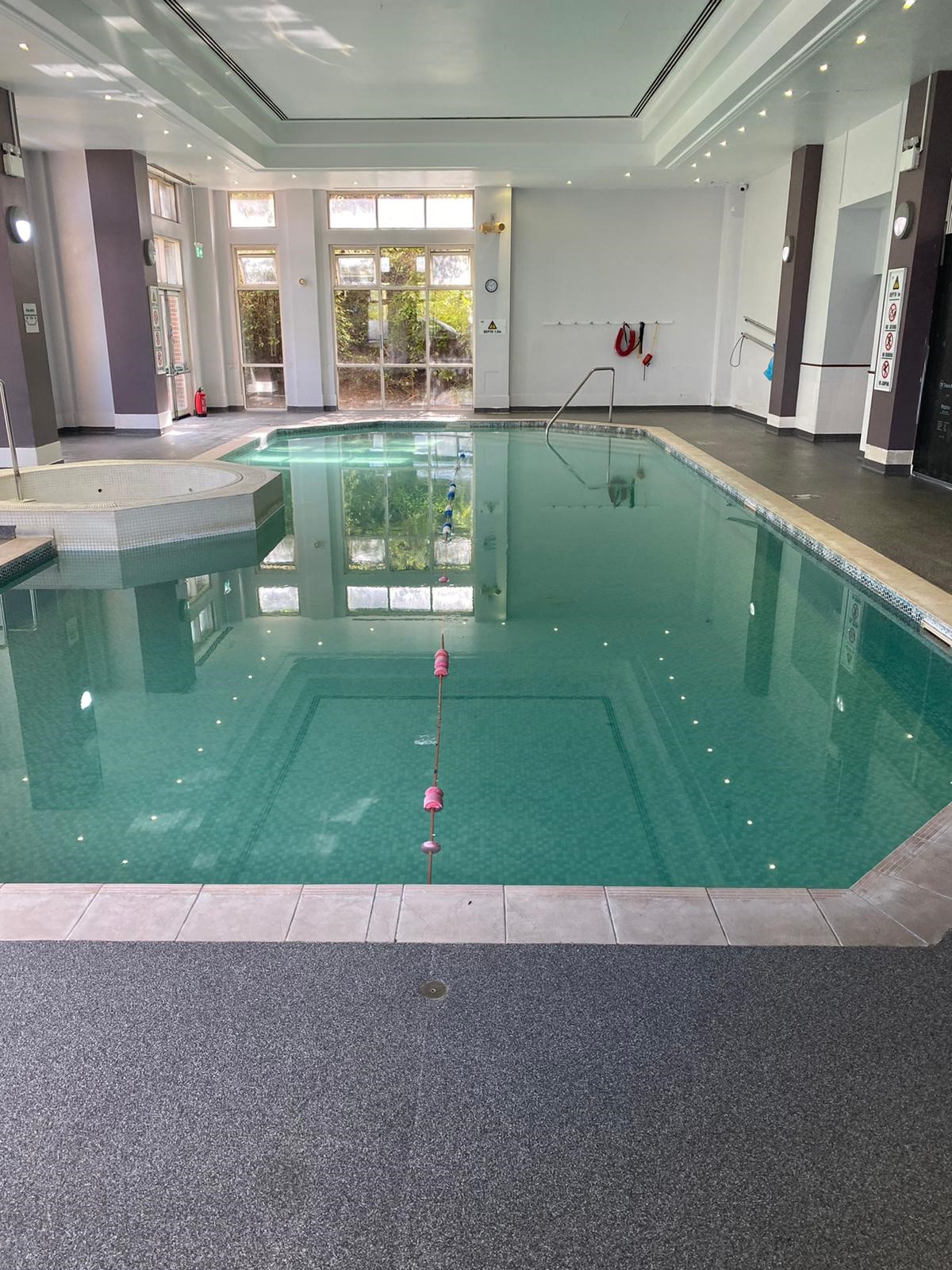 Swimming Pool For Hotel with resin flooring installed by RESYN