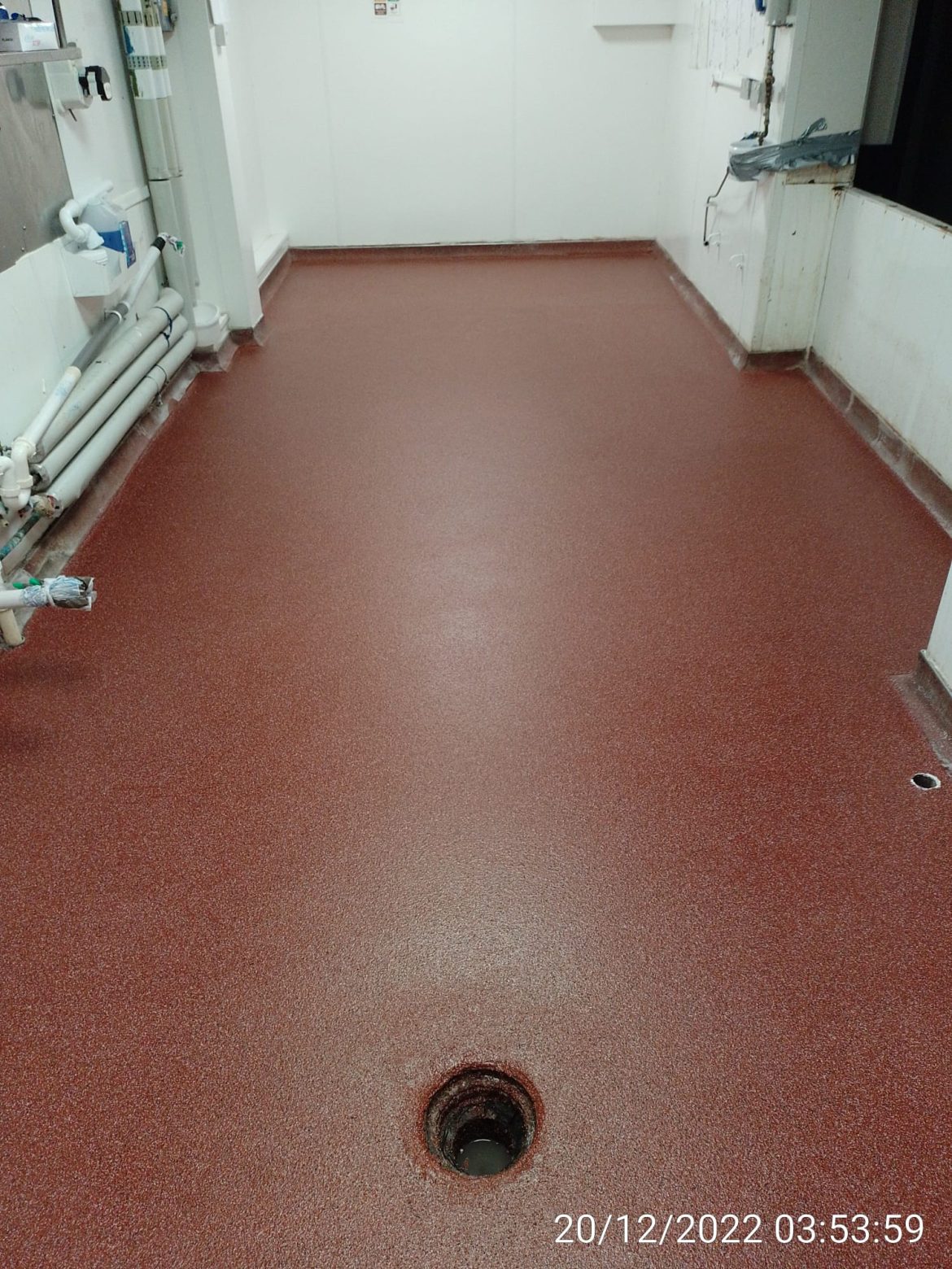 Red New resin kitchen floor with a tight deadline and back-to-back shifts