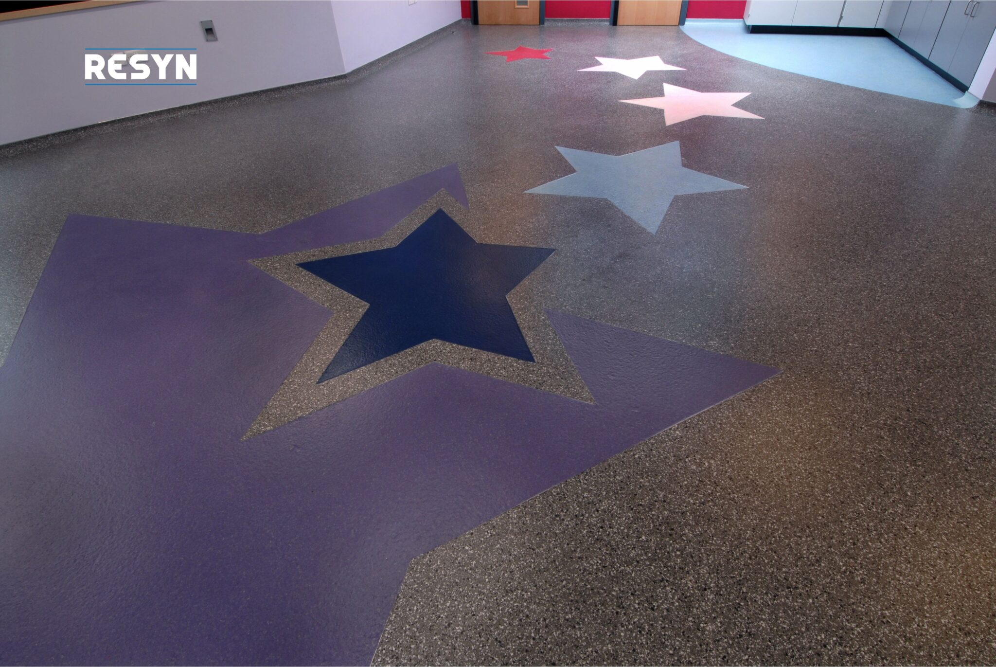 RESYN install bespoke resin flooring design for St Johns School.